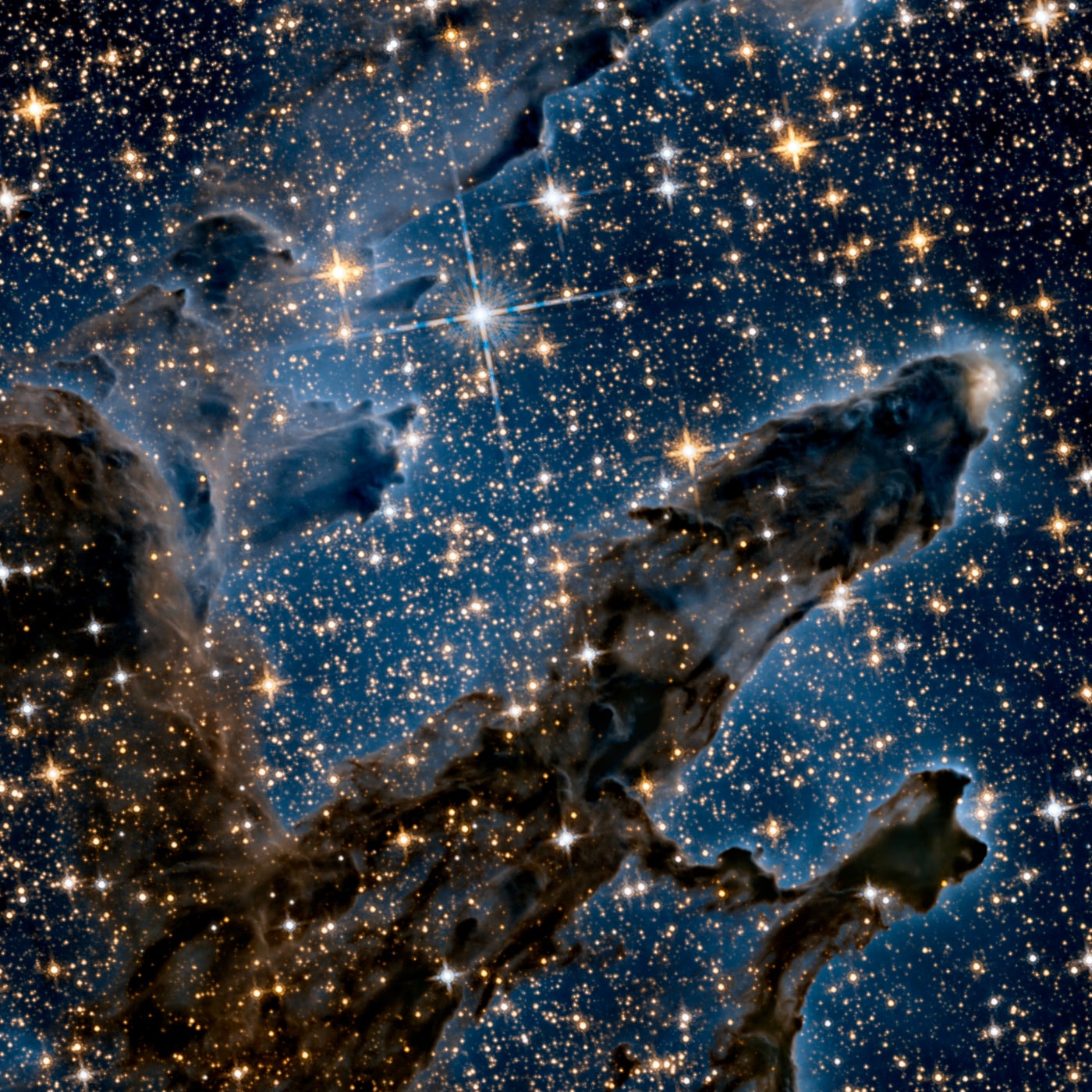 Pilares da Criação, na Nebulosa da Águia registrado pelo telescópio espacial Hubble