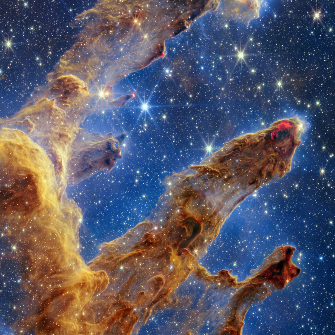 Pilares da Criação, na Nebulosa da Águia registrado pelo telescópio espacial James Webb