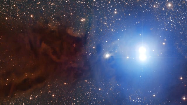Ilustração artística de Nuvem escura de Lupus 3, região de formação de estrelas, em imagem do MPG/ESO 2.2-metre telescope