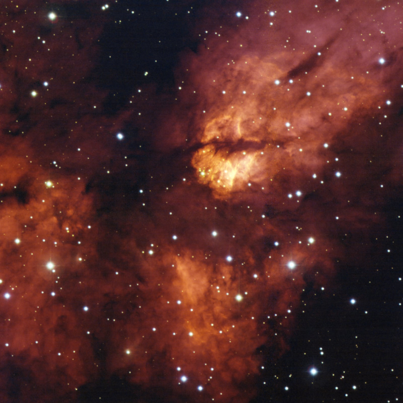 Berçário estelar RCW 38, região de formação de estrelas registrada pelo MPG/ESO 2.2-metre telescope