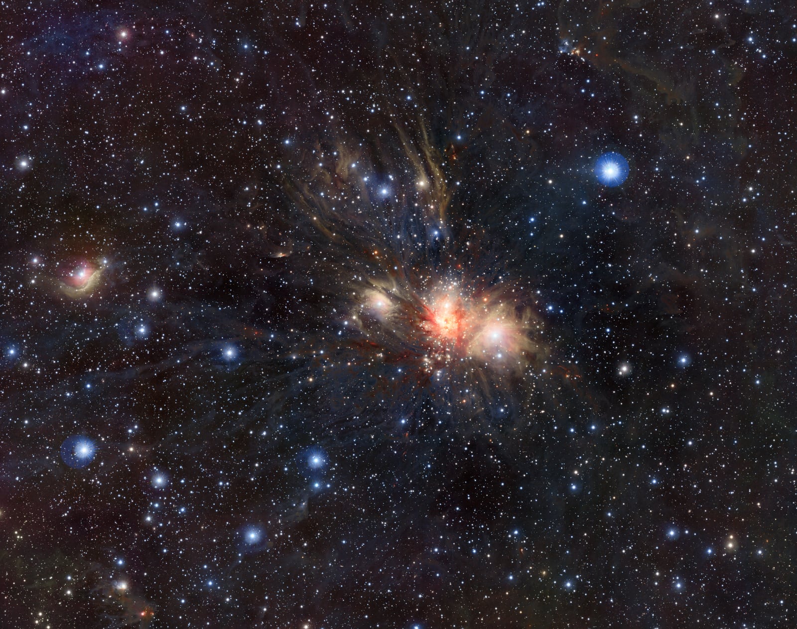 Nebulosa Monoceros R2, região de hidrogênio ionizado registrada pelo Visible and Infrared Survey Telescope for Astronomy