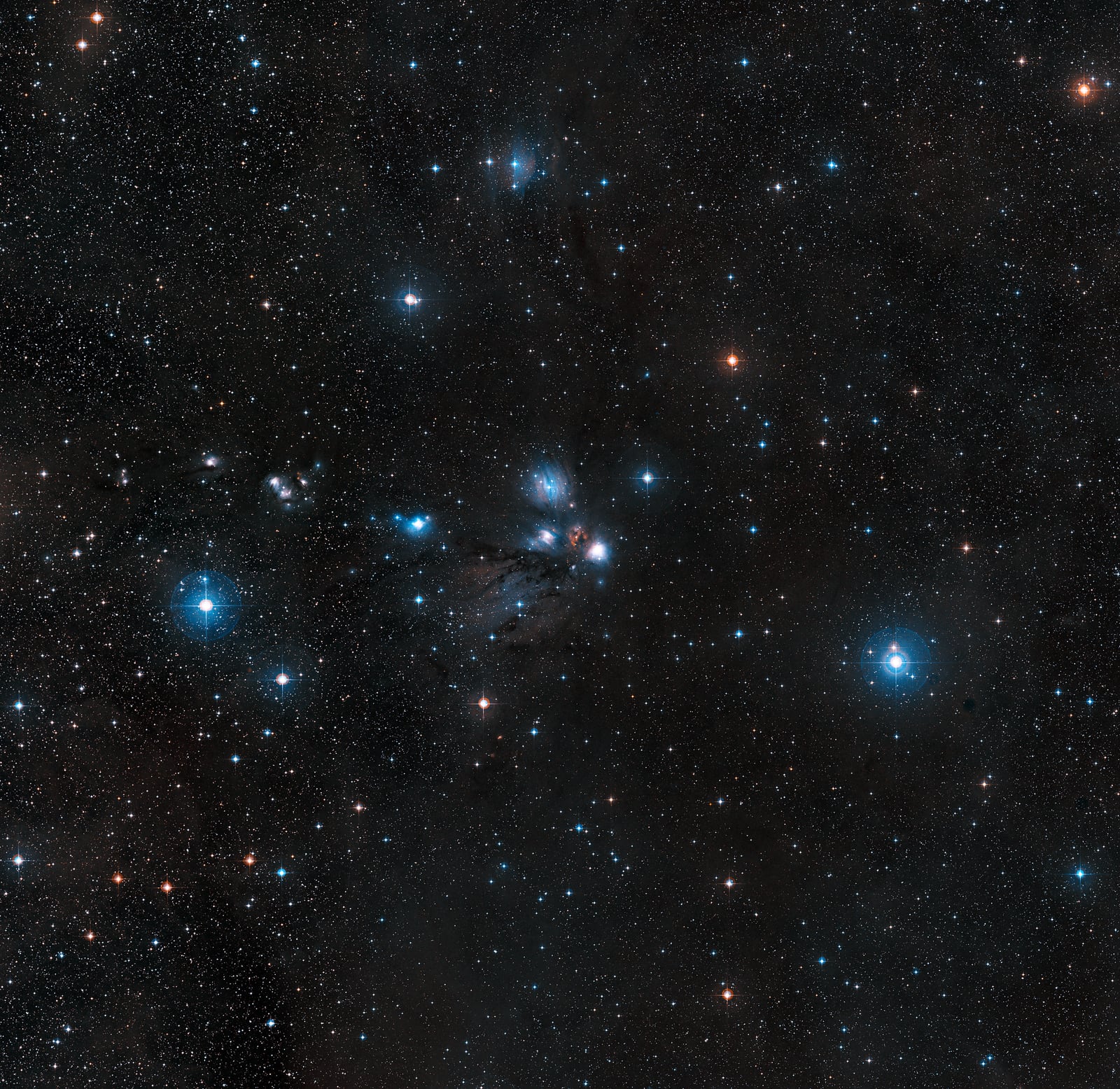 Nebulosa Monoceros R2, região de hidrogênio ionizado, em imagem do Digitized Sky Survey 2