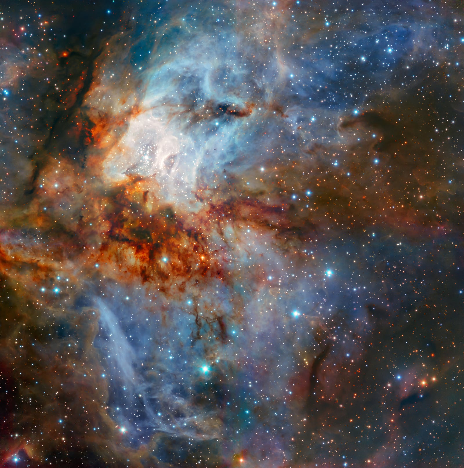 Berçário estelar RCW 38, região de formação de estrelas registrada pelo Very Large Telescope