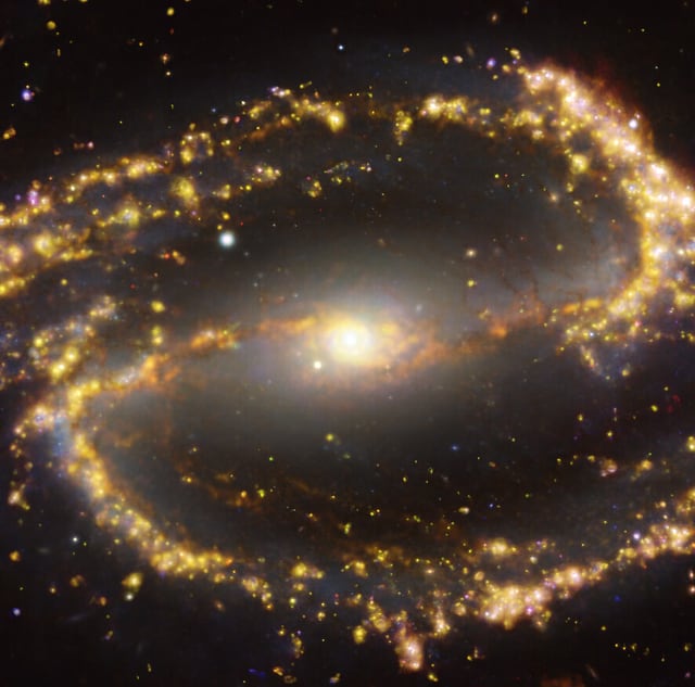 Galáxia espiral barrada NGC 1300, galáxia seyfert tipo 2, em imagem do Atacama Large Millimeter/submillimeter Array
