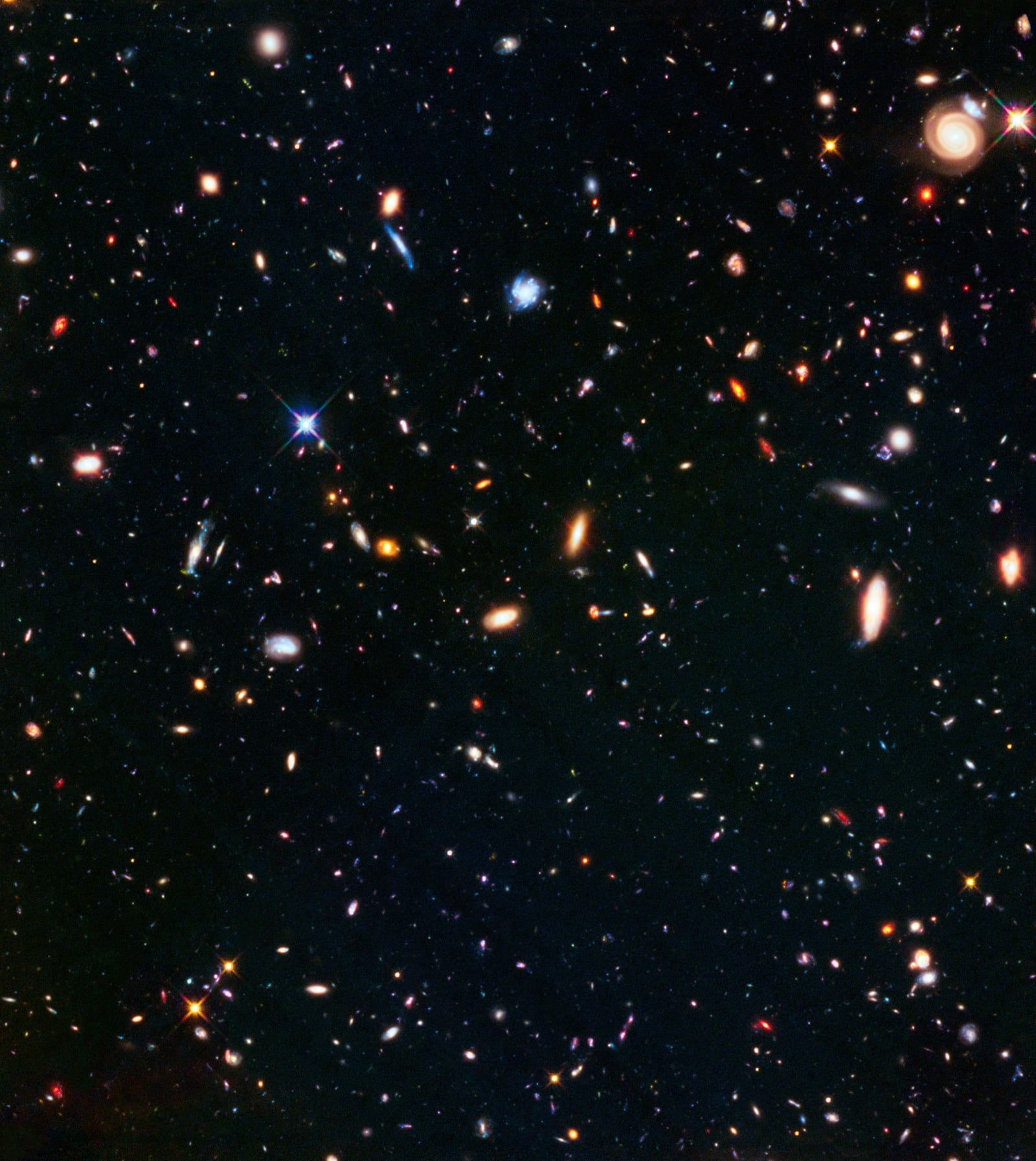 Aglomerado Abell S1063, aglomerado de galáxias, em imagem do Hubble Space Telescope