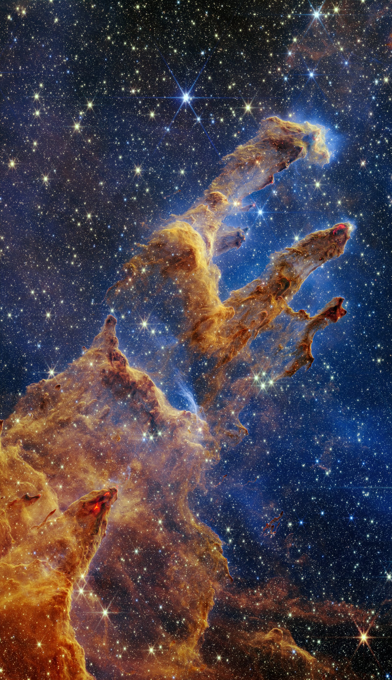 Pilares da Criação, na Nebulosa da Águia, nebulosa de emissão registrada pelo James Webb Space Telescope