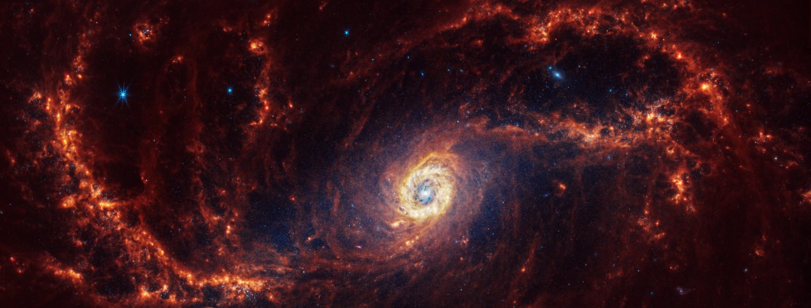 Galáxia NGC 1672, galáxia, em imagem do James Webb Space Telescope