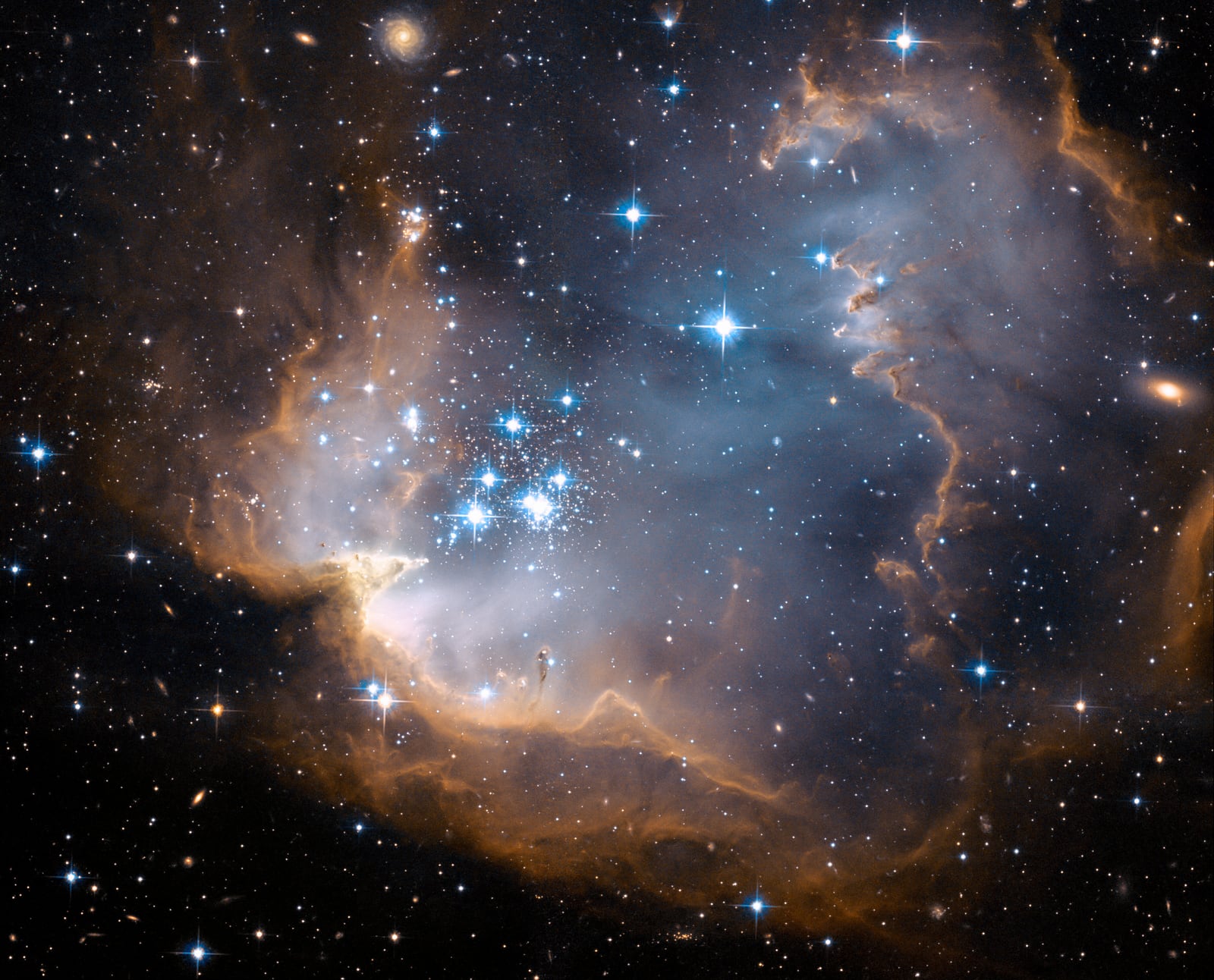 Aglomerado NGC 602, aglomerado de estrelas registrada pelo Hubble Space Telescope
